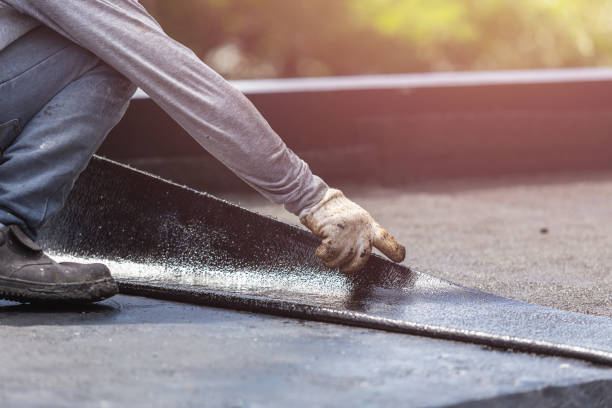 Professional Exterior Waterproofing technician working in Muir, MI